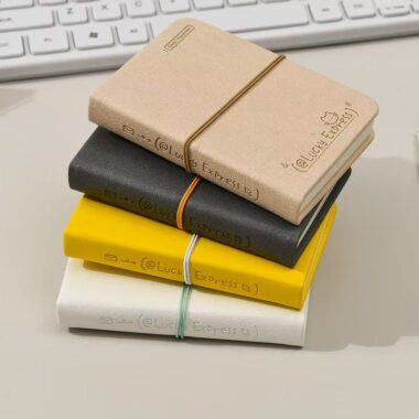 Mini portable cute notepad with strap closure