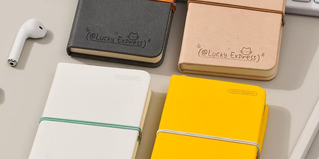 Mini portable cute notepad with strap closure