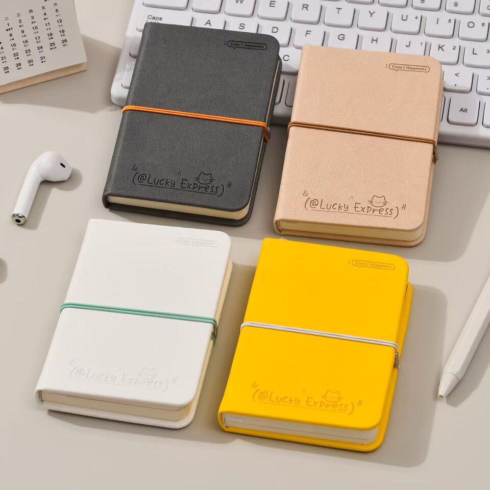 Mini portable cute notepad with strap closure