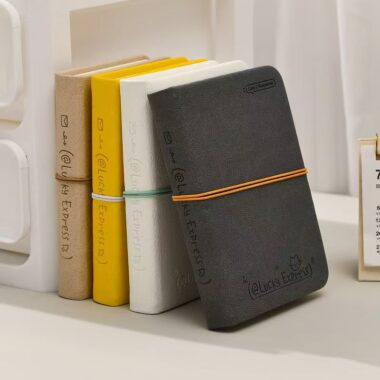 Mini portable cute notepad with strap closure