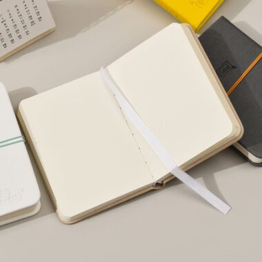Mini portable cute notepad with strap closure